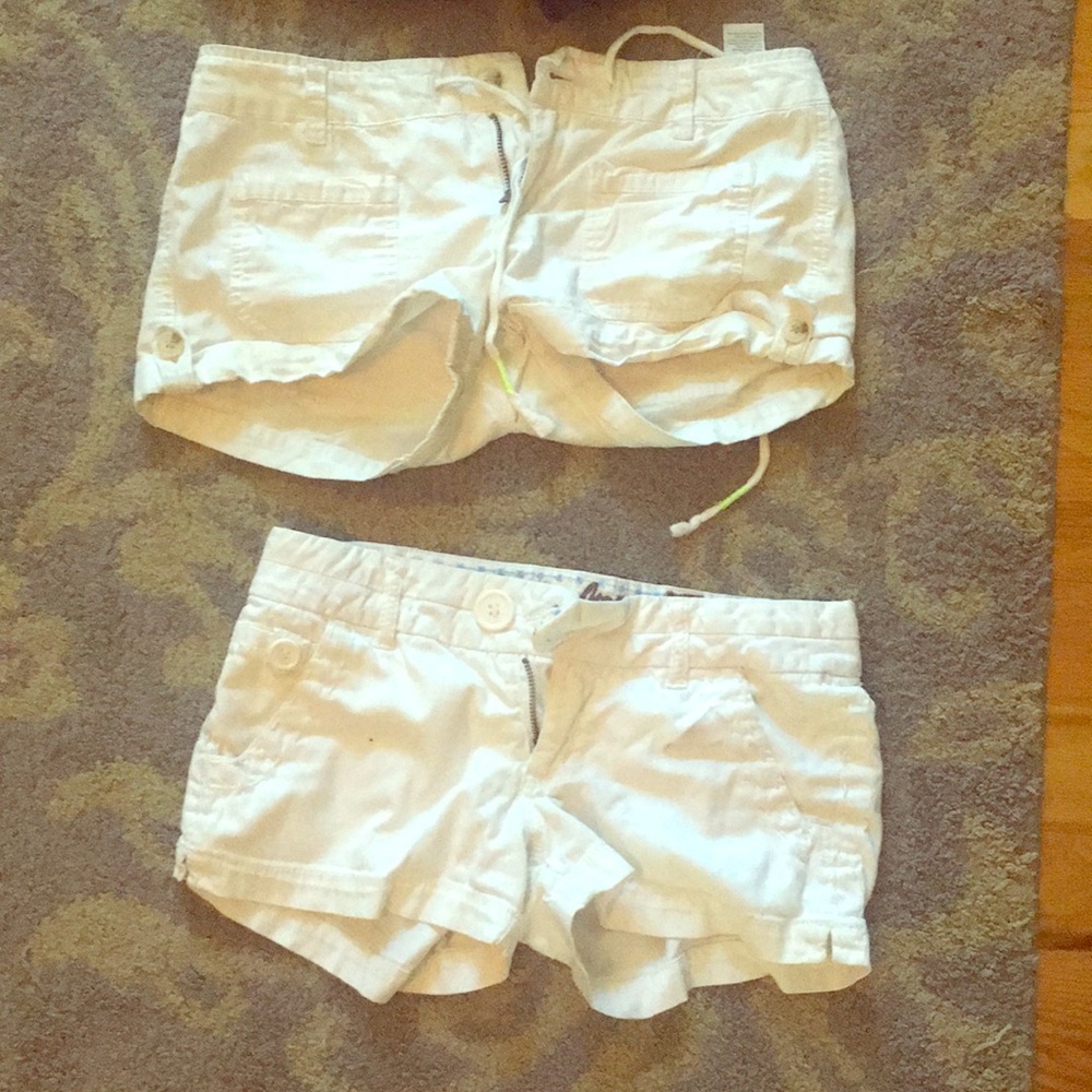 Two pairs of white shorts, small